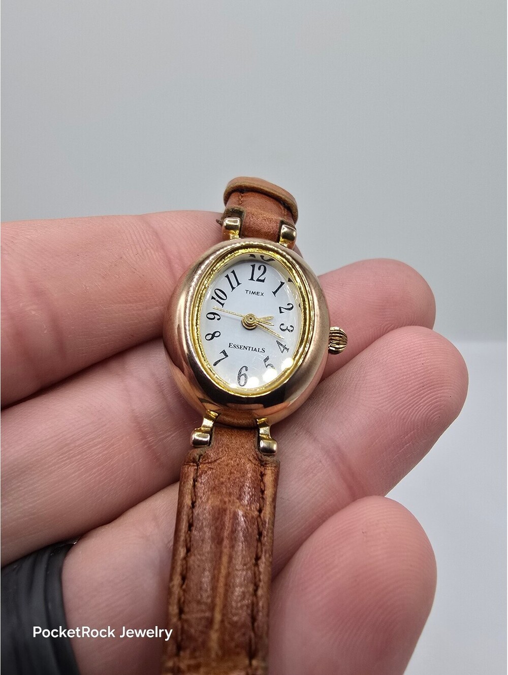 Timex Essentials Women’s Quartz Analog Oval Gold Tone White Dial Brown Leather